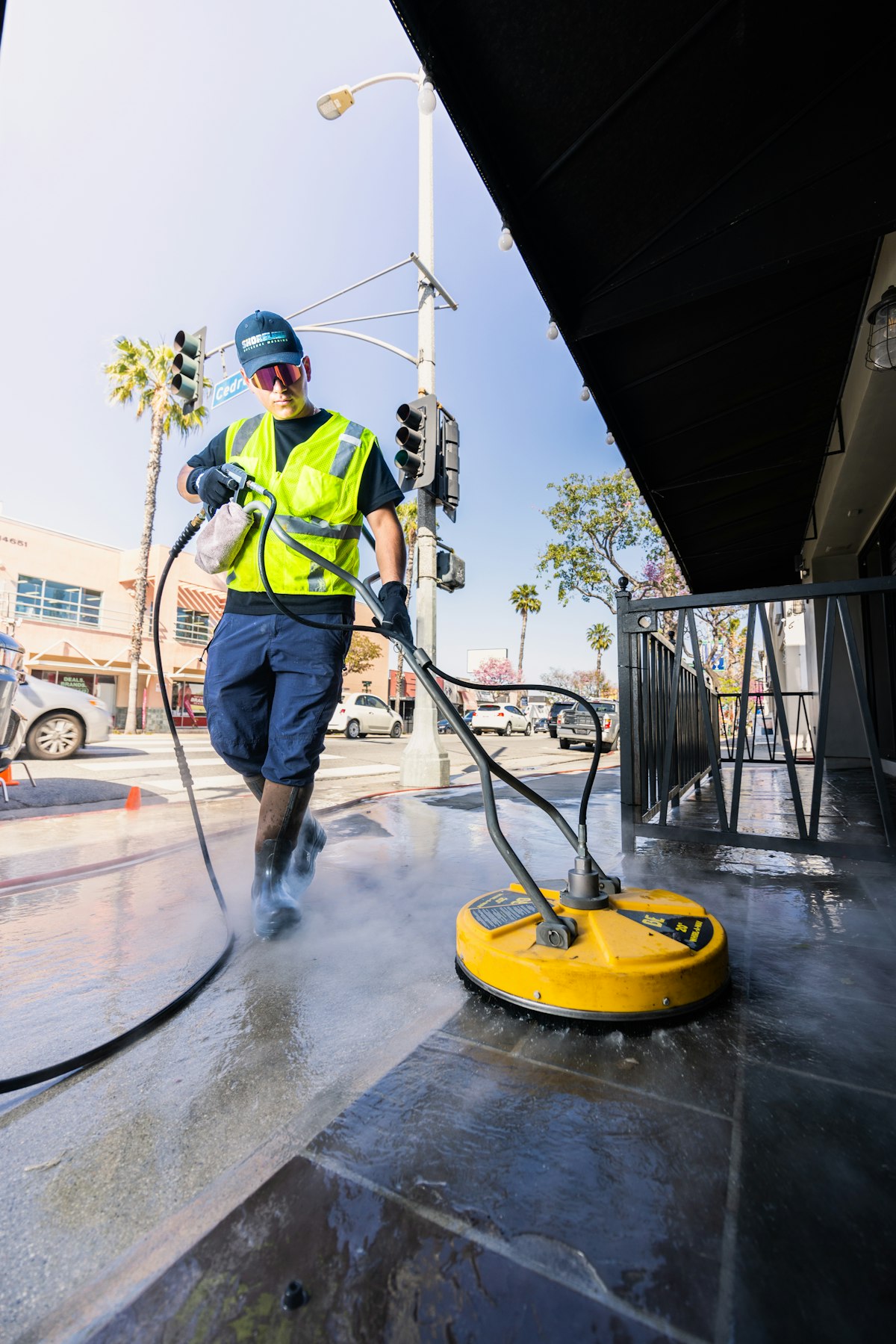 Tom's Pressure Washing crew on the job